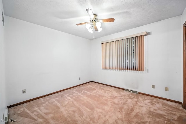 114 Corrin Cir, Cortland, OH 44410 - carpeted spare room with a ceiling fan and baseboards