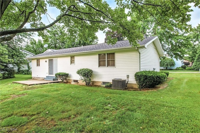 114 Corrin Cir, Cortland, OH 44410 - rear view of house with a yard, entry steps, a patio area, and roof with shingles