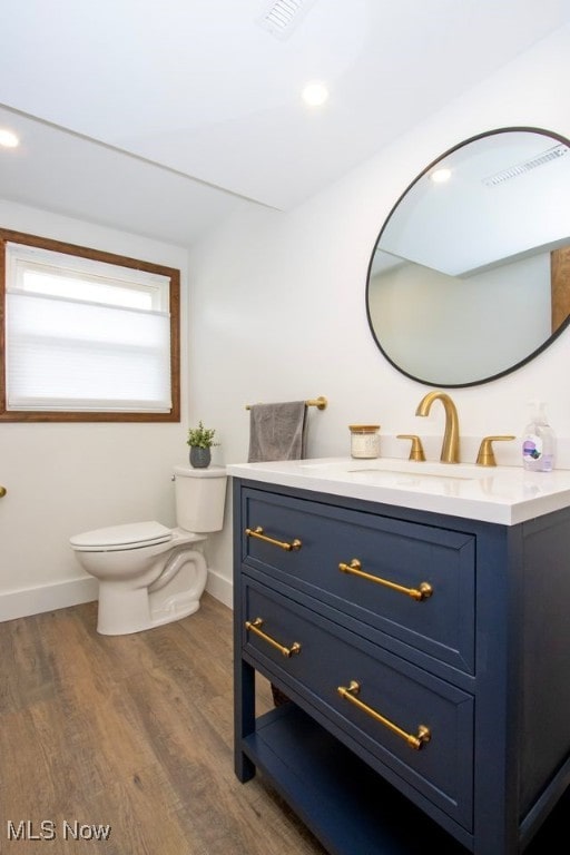 18259 William Dr, Doylestown, OH 44230 - bathroom with vanity and wood finished floors