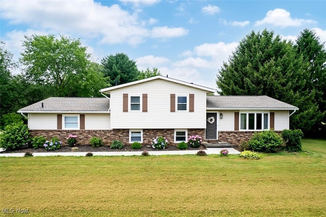 18259 William Dr, Doylestown, OH 44230 - split level home with brick siding and a front yard