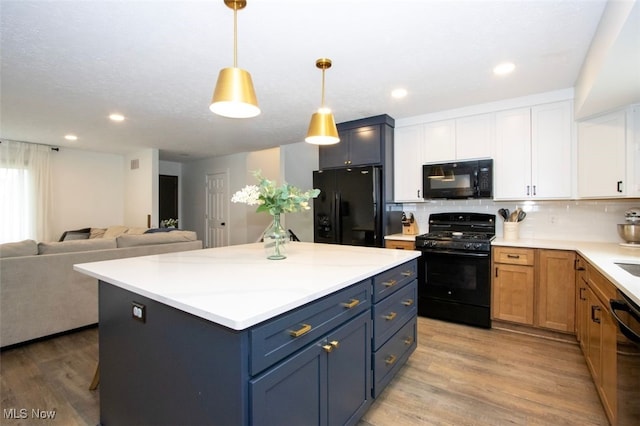 18259 William Dr, Doylestown, OH 44230 - kitchen featuring black appliances, light wood finished floors, backsplash, white cabinetry, and recessed lighting