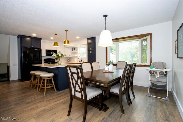 18259 William Dr, Doylestown, OH 44230 - dining space featuring wood finished floors and recessed lighting
