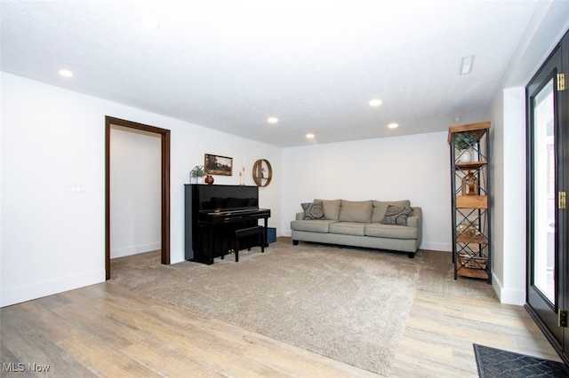 18259 William Dr, Doylestown, OH 44230 - living area featuring light wood-style floors and recessed lighting