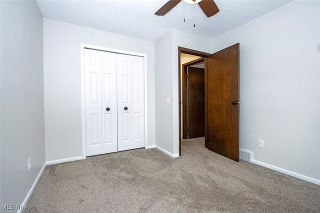 18259 William Dr, Doylestown, OH 44230 - unfurnished bedroom featuring carpet, a closet, and ceiling fan