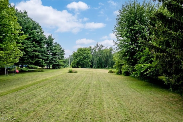 18259 William Dr, Doylestown, OH 44230 - view of grassy yard with a playground
