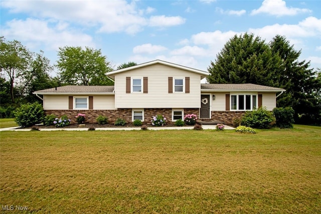 18259 William Dr, Doylestown, OH 44230 - tri-level home with a front yard and brick siding
