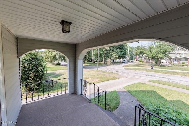 3817 Washington Park Blvd, Newburgh Heights, OH 44105 - covered porch with a yard