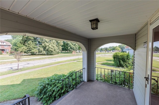 3817 Washington Park Blvd, Newburgh Heights, OH 44105 - porch featuring a yard
