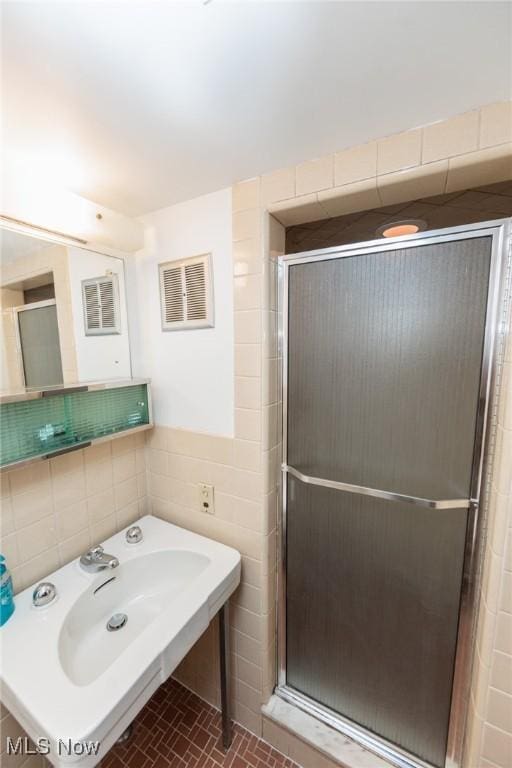 3817 Washington Park Blvd, Newburgh Heights, OH 44105 - full bath featuring tile walls and a shower stall
