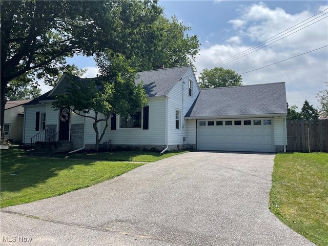 35958 Hiawatha Blvd, Eastlake, OH 44095 - view of front of house featuring a garage, concrete driveway, and a shingled roof