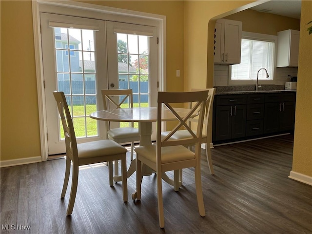 35958 Hiawatha Blvd, Eastlake, OH 44095 - dining space featuring dark wood-style flooring, healthy amount of natural light, and french doors