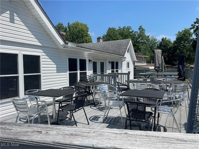 35958 Hiawatha Blvd, Eastlake, OH 44095 - wooden terrace with outdoor dining space and french doors