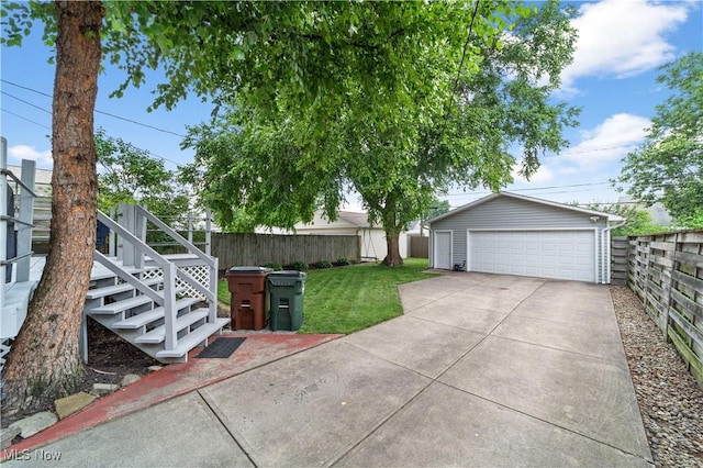 7604 Spring Garden Rd, Parma, OH 44129 - view of yard featuring a garage, an outbuilding, and stairs