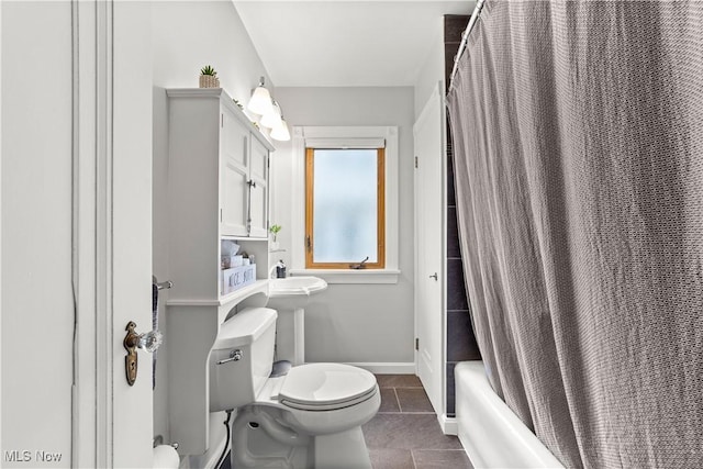 7604 Spring Garden Rd, Parma, OH 44129 - bathroom with shower / bath combo and tile patterned floors