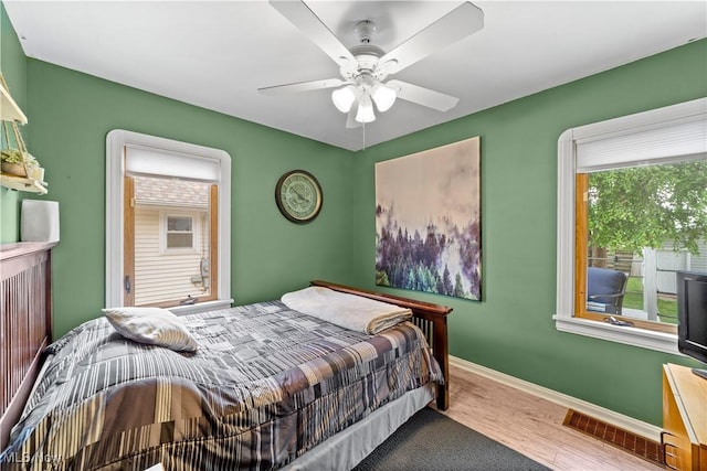 7604 Spring Garden Rd, Parma, OH 44129 - bedroom with wood finished floors and ceiling fan