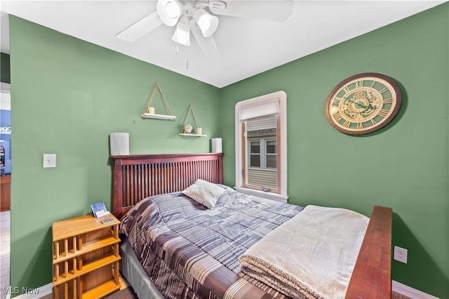 7604 Spring Garden Rd, Parma, OH 44129 - bedroom with baseboards and a ceiling fan