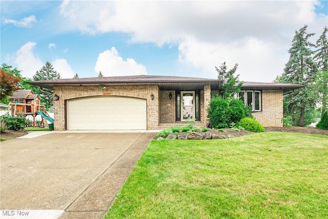 2640 Fleger Dr, Parma, OH 44134 - single story home featuring brick siding, a garage, concrete driveway, and a front lawn