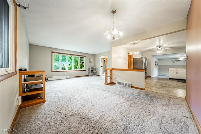 2640 Fleger Dr, Parma, OH 44134 - unfurnished living room with carpet flooring, a chandelier, and a ceiling fan