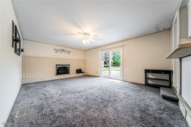 2640 Fleger Dr, Parma, OH 44134 - unfurnished living room featuring carpet, ceiling fan, and a brick fireplace