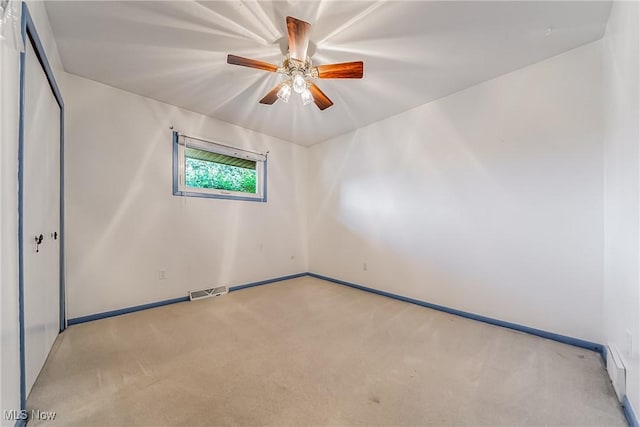 2640 Fleger Dr, Parma, OH 44134 - carpeted empty room featuring baseboards and a ceiling fan