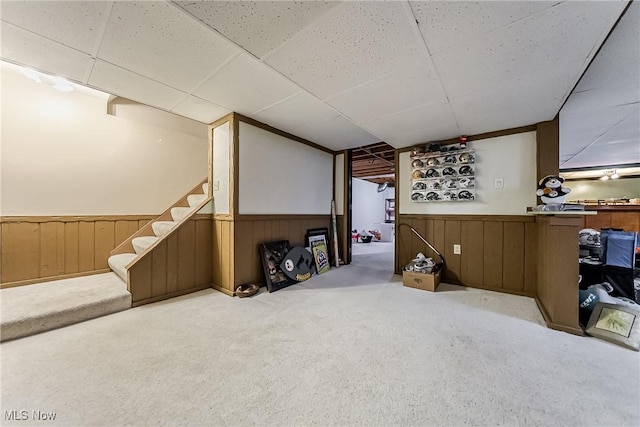 2640 Fleger Dr, Parma, OH 44134 - finished basement with a paneled ceiling, a wainscoted wall, carpet flooring, and stairs