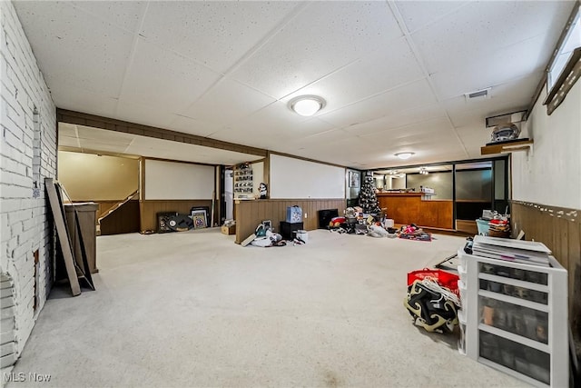 2640 Fleger Dr, Parma, OH 44134 - finished basement featuring a wainscoted wall, a drop ceiling, and carpet flooring
