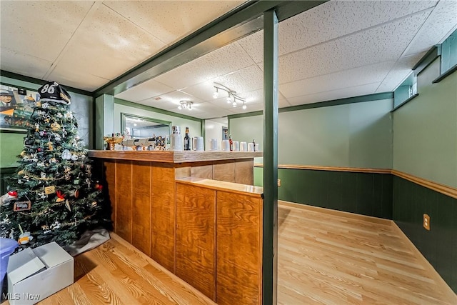 2640 Fleger Dr, Parma, OH 44134 - misc room featuring wood finished floors, a bar, and wainscoting
