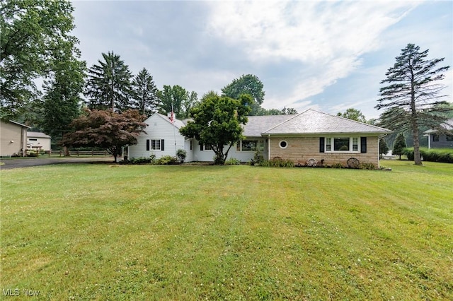 11756 Clarke Rd, Columbia Station, OH 44028 - ranch-style house with stone siding and a front yard