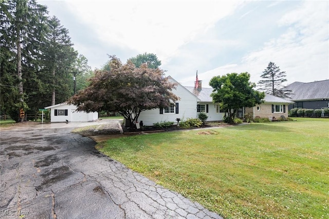 11756 Clarke Rd, Columbia Station, OH 44028 - view of front of house featuring asphalt driveway and a front yard