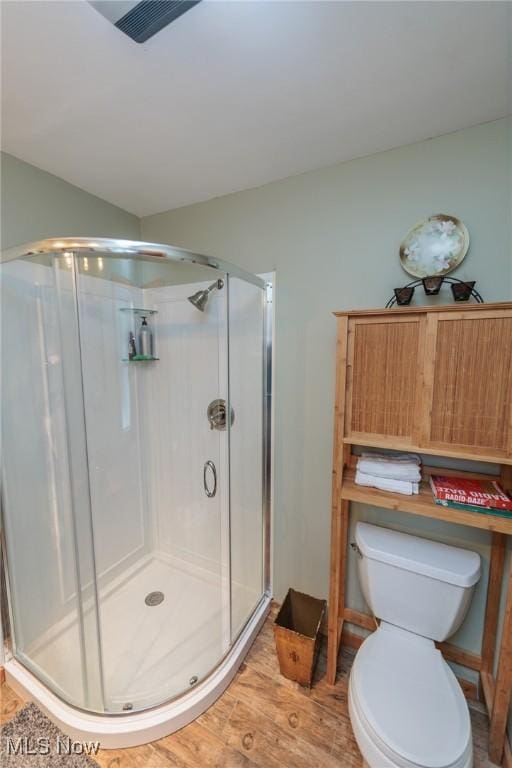 11756 Clarke Rd, Columbia Station, OH 44028 - bathroom with a shower stall, wood finished floors, and vaulted ceiling