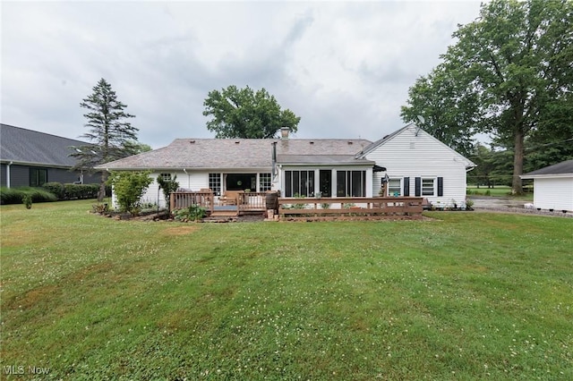 11756 Clarke Rd, Columbia Station, OH 44028 - back of house with a deck, a yard, and a sunroom