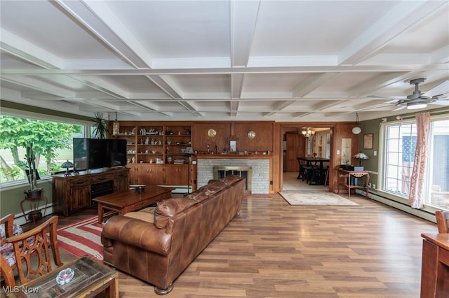 11756 Clarke Rd, Columbia Station, OH 44028 - living room with light wood-style floors, coffered ceiling, a baseboard radiator, beamed ceiling, and a ceiling fan