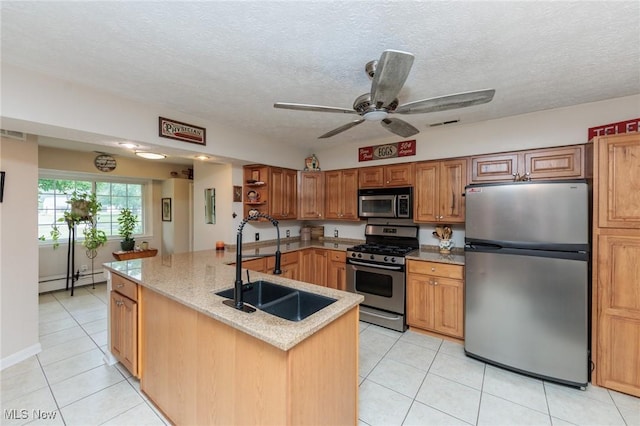 11756 Clarke Rd, Columbia Station, OH 44028 - kitchen featuring appliances with stainless steel finishes, a baseboard radiator, light tile patterned floors, a ceiling fan, and open shelves