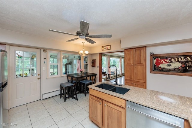 11756 Clarke Rd, Columbia Station, OH 44028 - kitchen featuring stainless steel appliances, baseboard heating, light tile patterned floors, ceiling fan, and a textured ceiling