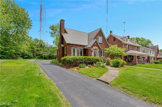 4019 Euclid Blvd, Youngstown, OH 44512 - view of front of property with a front lawn and brick siding