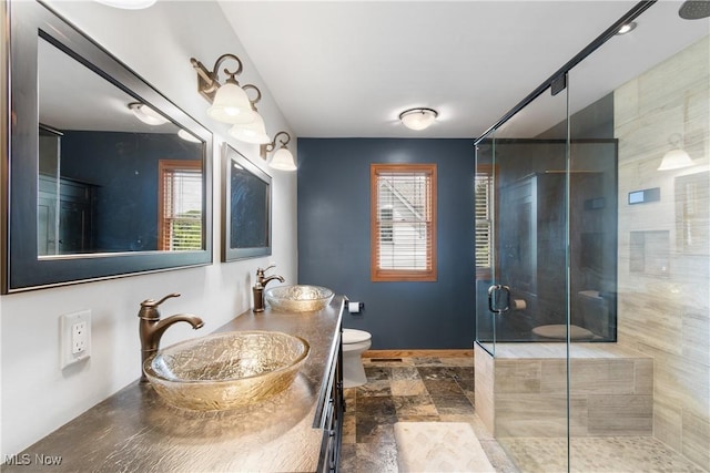 3100 Ravineview Cir, Stow, OH 44224 - full bathroom with a stall shower, double vanity, and stone finish flooring
