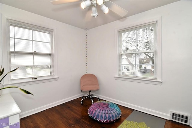 3921 Grosvenor Rd, South Euclid, OH 44118 - living area with healthy amount of natural light and wood finished floors