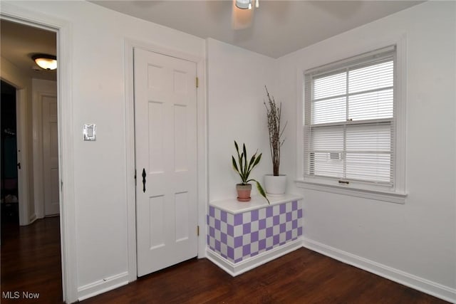 3921 Grosvenor Rd, South Euclid, OH 44118 - corridor with dark wood-style floors and baseboards