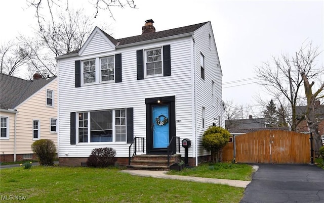 3921 Grosvenor Rd, South Euclid, OH 44118 - view of front facade featuring a chimney