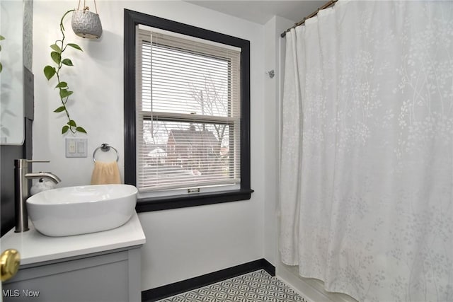 3921 Grosvenor Rd, South Euclid, OH 44118 - bathroom featuring vanity and a shower with shower curtain