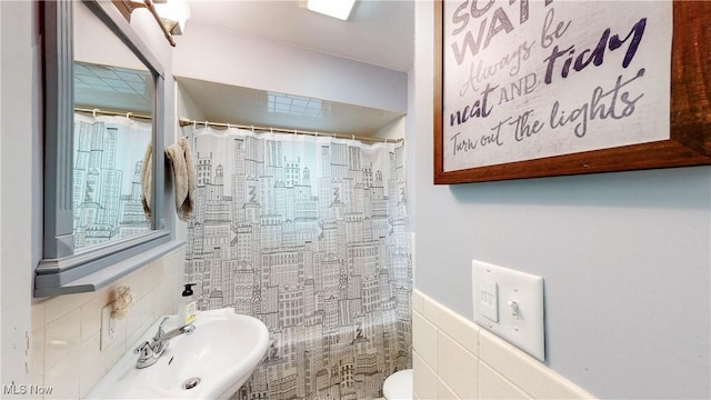 87 Holcomb Ave, Mogadore, OH 44260 - full bathroom with tile walls and curtained shower