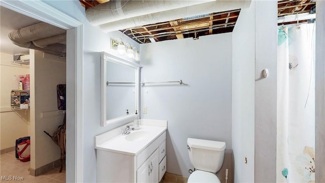 87 Holcomb Ave, Mogadore, OH 44260 - bathroom featuring vanity, tile patterned floors, and curtained shower