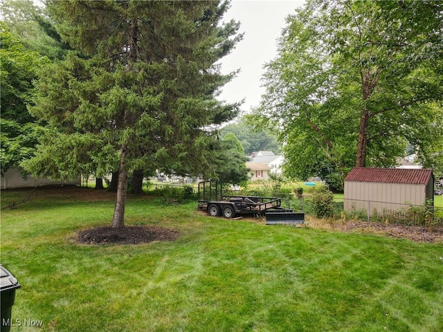 87 Holcomb Ave, Mogadore, OH 44260 - view of yard with a shed
