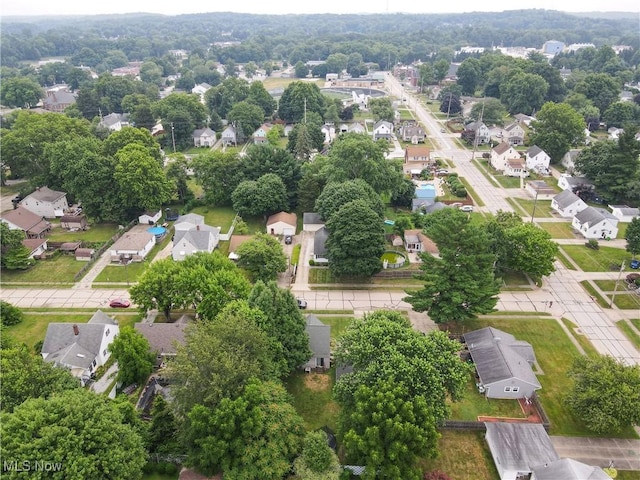 87 Holcomb Ave, Mogadore, OH 44260 - aerial view of property and surrounding area featuring nearby suburban area
