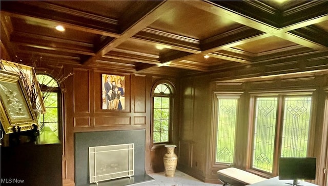 23547 Quail Holw, Westlake, OH 44145 - entryway with wood walls, a fireplace, coffered ceiling, ornamental molding, and recessed lighting