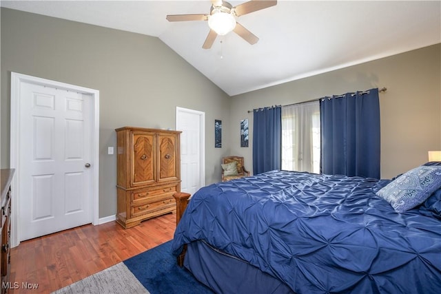 4504 Ledge Ct, Kent, OH 44240 - bedroom with wood finished floors, lofted ceiling, and ceiling fan