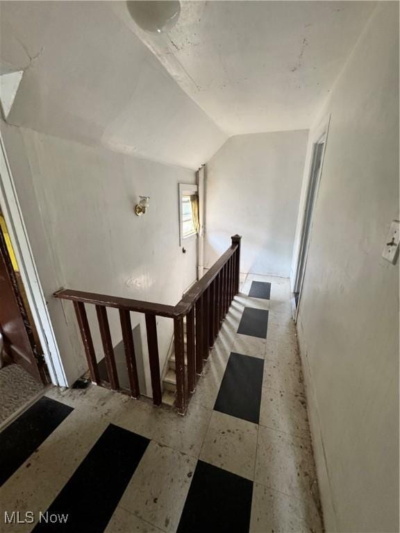 699 E 156th St, Cleveland, OH 44110 - staircase featuring vaulted ceiling