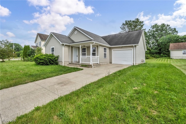 1350 Elmside St, Alliance, OH 44601 - single story home featuring covered porch, driveway, a garage, and a front lawn