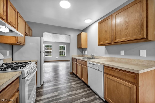 1350 Elmside St, Alliance, OH 44601 - kitchen with white appliances, under cabinet range hood, dark wood finished floors, light countertops, and brown cabinetry