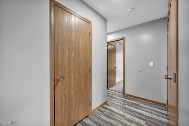 1350 Elmside St, Alliance, OH 44601 - corridor with wood finished floors and baseboards